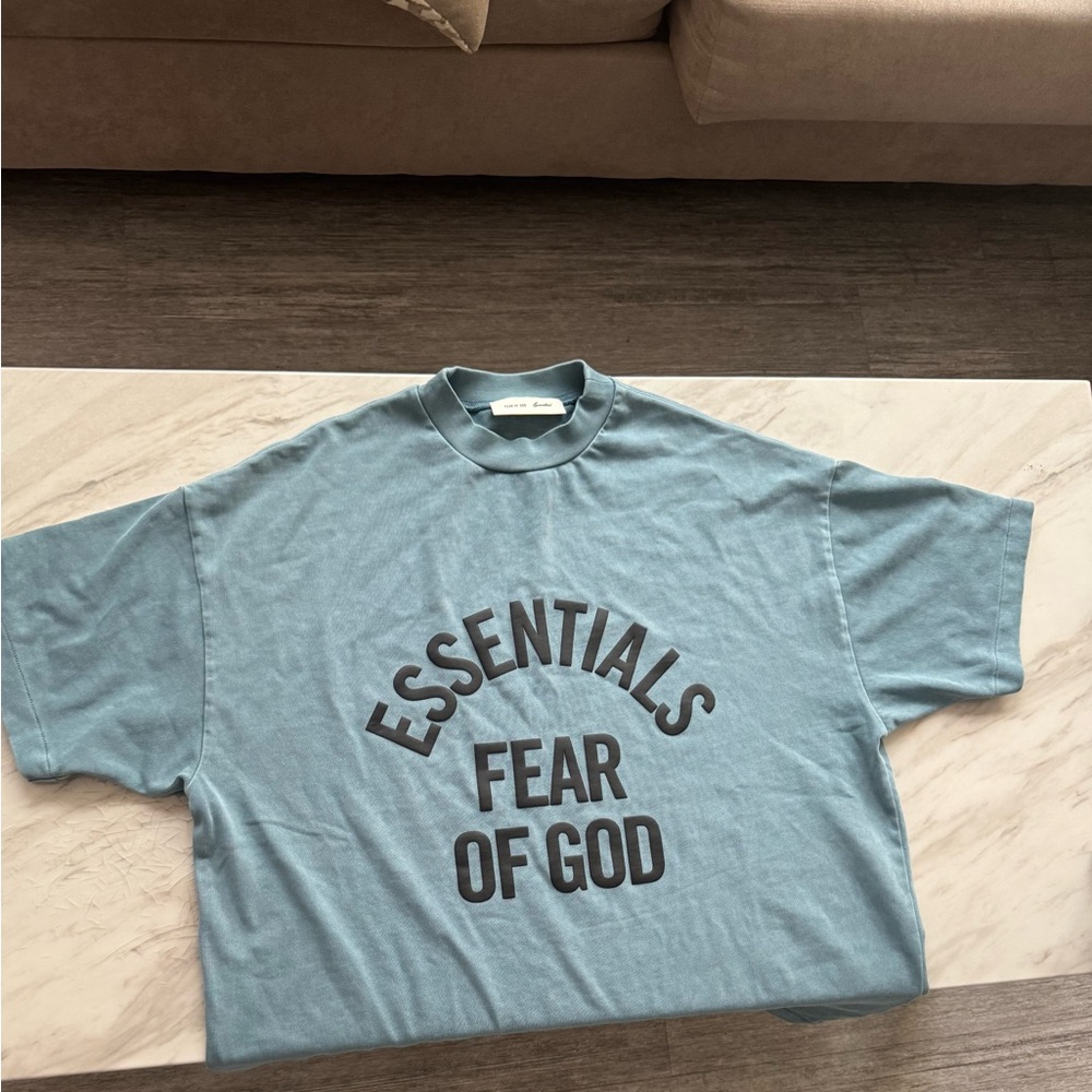 Fear of God Essentials Light Blue Campus 90s Tee